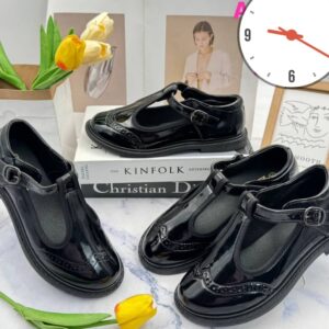 Buckle school shoe
